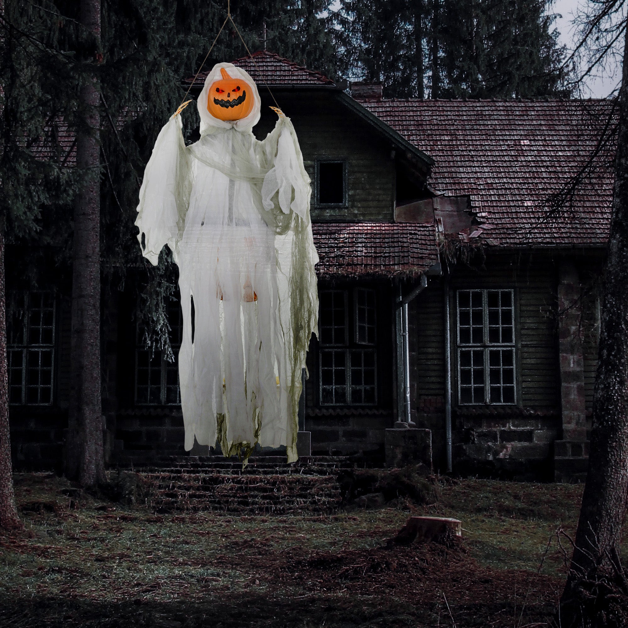 Hanging pumpkin-ghost shown against a plain background