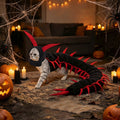 Grey cat wearing the 50-inch black and red centipede costume with hood and antennae, in a Halloween-decorated room